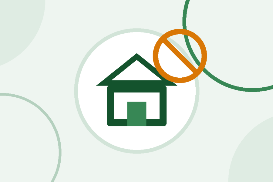 Icono de una casa con una señal de prohibido